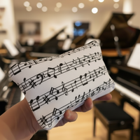 Faulenzer Kosmetiktasche Musiknoten weiß