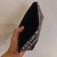 Faulenzer Kosmetiktasche Musiknoten schwarz